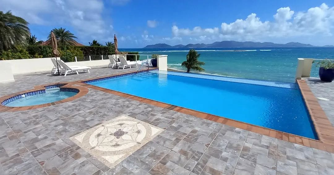 Placid Pools — infinity pool with ocean view
