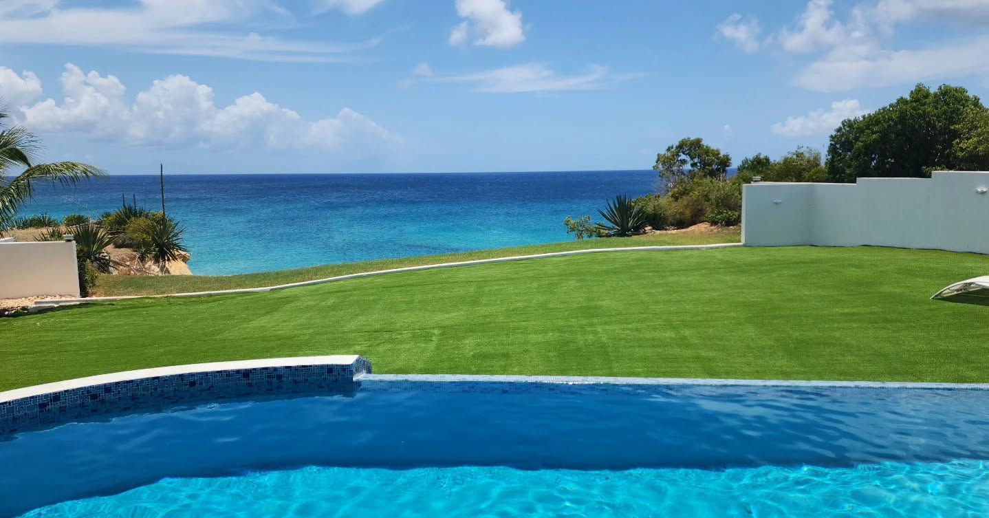 Well-maintained pool with ocean view